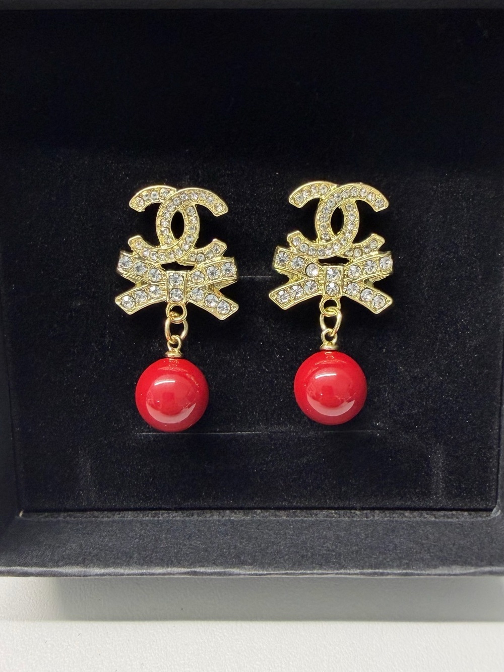 Gold Crystal Bow Drop Earrings with Red Bead - Picture 3 of 4